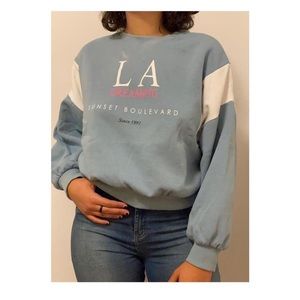 used crewneck • cropped fit • light stain on the front